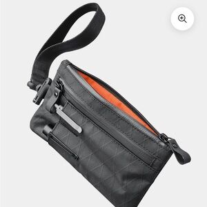 NWT Alpaka Zip Clutch